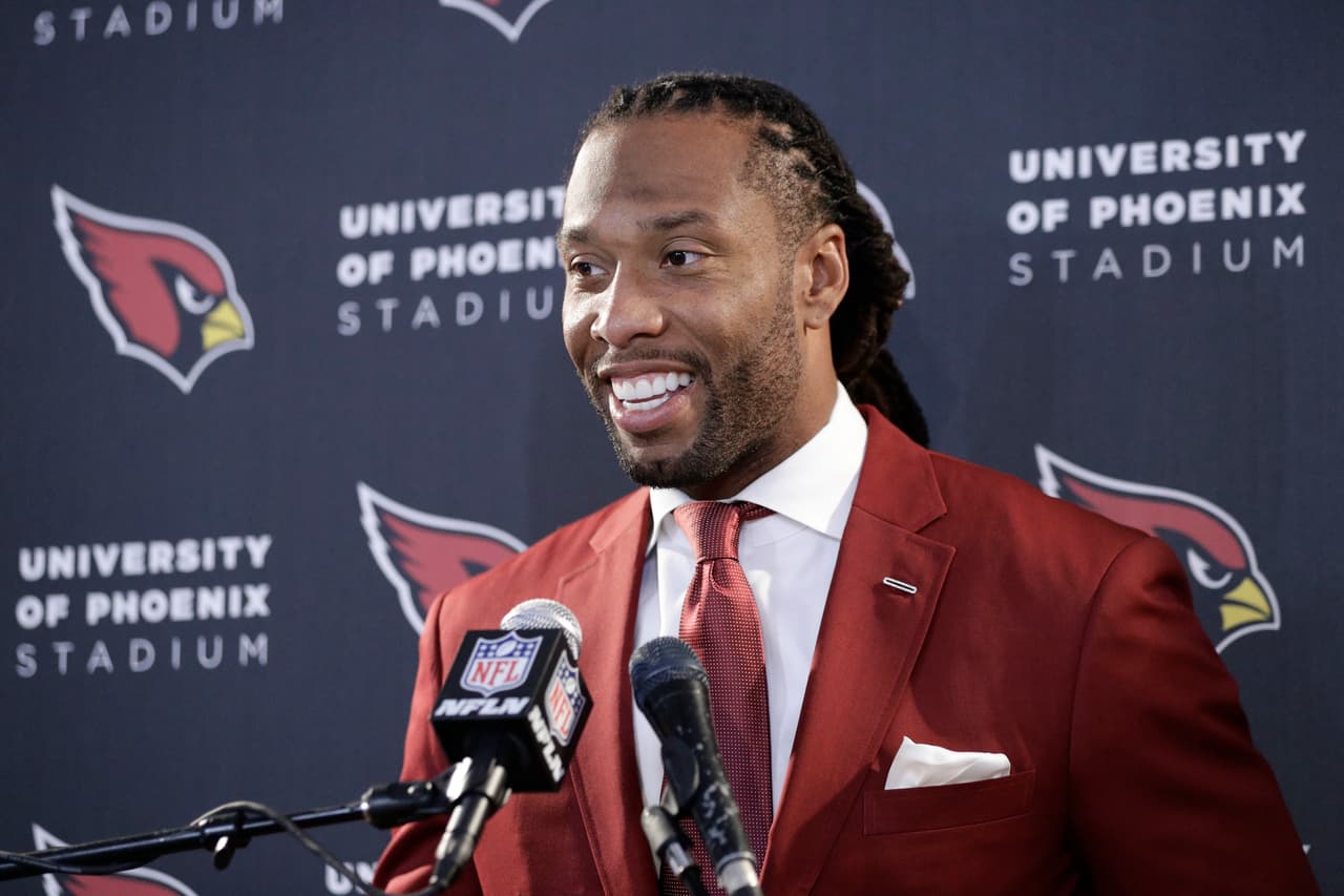 Arizona Cardinals wide receiver Larry Fitzgerald talks during a news conference after an NFL football game against the Los Angeles Rams Sunday, Jan. 1, 2017, in Los Angeles. (AP Photo/Jae C. Hong)