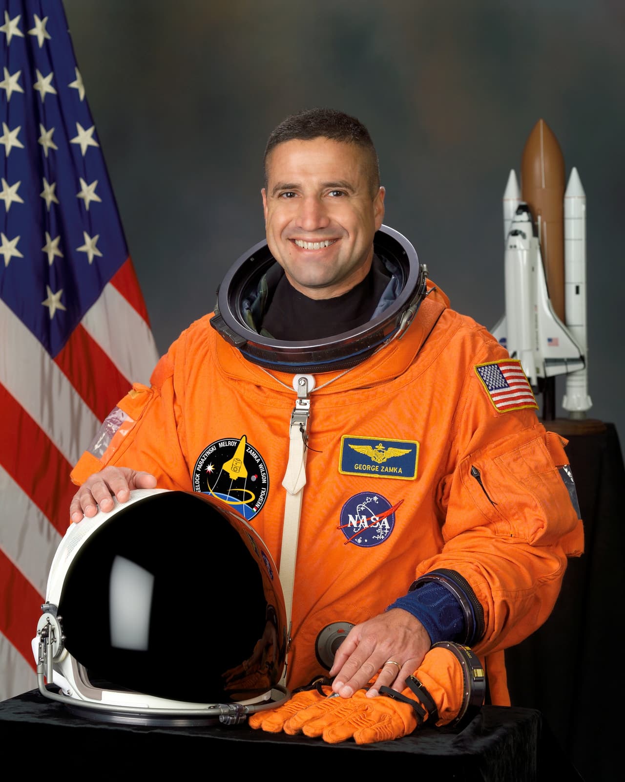 George D. Zamka nació en 1962 en la ciudad de Jersey, New Jersey. Es de ascendencia colombiana. La NASA lo seleccionó como astronauta en 1998. En 2007, su primer vuelo espacial, sirvió como piloto en la misión STS-120 del Trasbordador a la Estación Espacial Internacional. Zamka actuará como comandante de la tripulación STS-130.