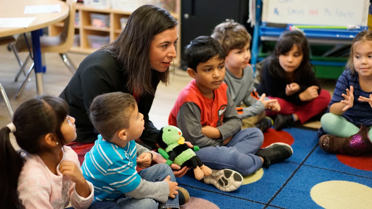 Daniela Anello, Head of School at the DC Bilingual Public Charter School checks in on a kindergarten class on Thursday Nov. 16, 2017 in Washington D.C.