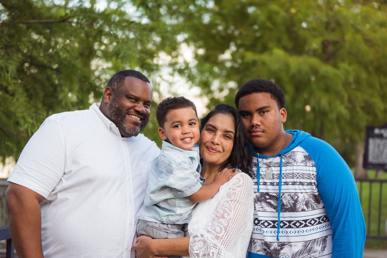 Caridad Galán with her husband, Floyd Jones, and their two children, Josiah, aged two and Anthony, aged 17 in Pensacola.