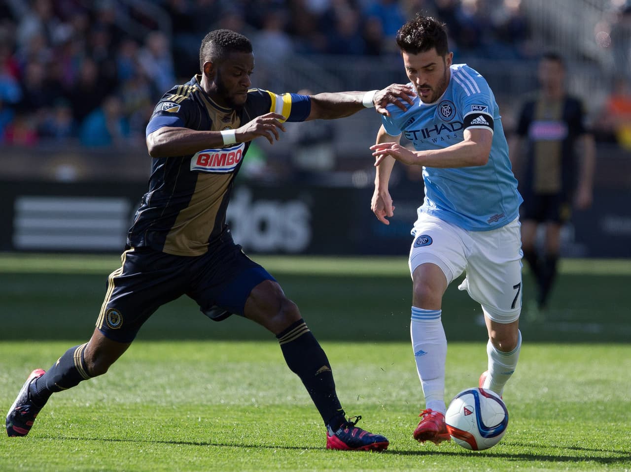 David Villa y Maurice Edu