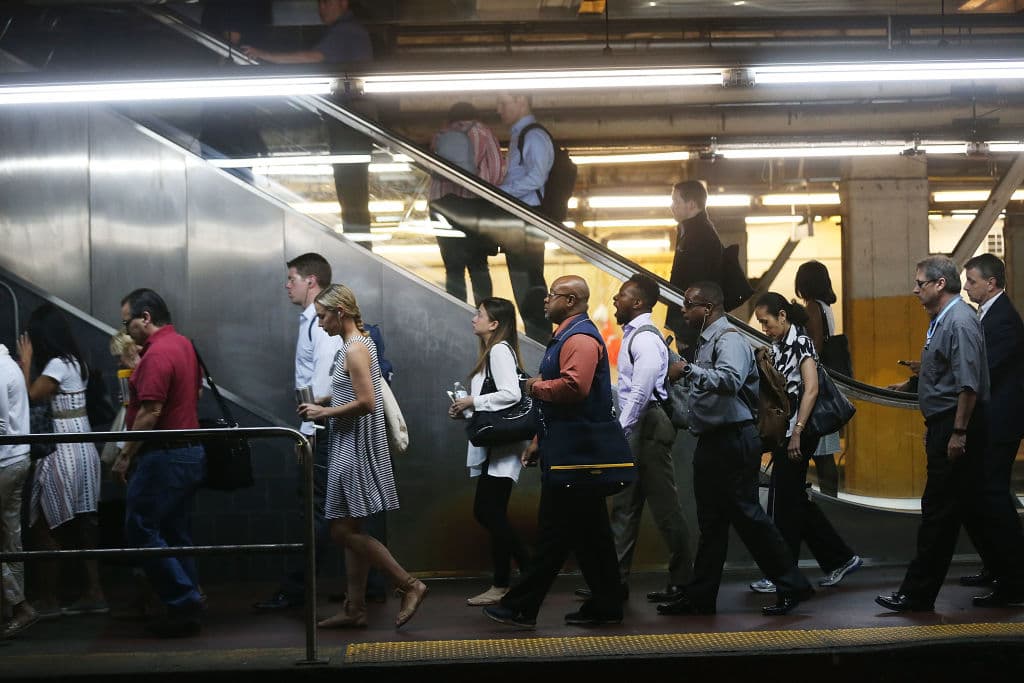 NEW YORK, NY - JULY 10: Commuters exit a train at Pennsylvania Station on the first morning of a long planned track repairs at the station, one of the busiest in the nation on July 10, 2017 in New York City. Commuters throughout the New York area are preparing for long delays and the use of alternate forms of transportation as the number of trains into Manhattan is being drastically reduced for the summer work. (Photo by Spencer Platt/Getty Images)