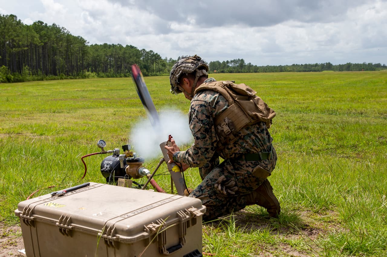 The White House announced this week that it will send 100 Switchblade drones, known as Tactical Unmanned Aerial Systems, to Ukraine. Switchblade drones are single-use 'kamikaze' weapons that are launched from a tube with blade-like wings that emerge when the device is in flight. Pictured: A US Marine launches a Switchblade drone during a training exercise at Camp Lejeune, North Carolina, 7 July 2021.