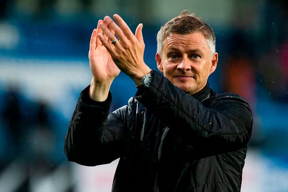 Molde FK´s headcoach Ole Gunnar Solskjaer celebrates after the UEFA Champions League third round, second leg qualifying football match between Molde FK and Hibernian at the Aker Stadium in Molde, Norway, on August 16, 2018. (Photo by Svein Ove Ekornesvaag / NTB SCANPIX / AFP) / Norway OUT (Photo credit should read SVEIN OVE EKORNESVAAG/AFP/Getty Images)