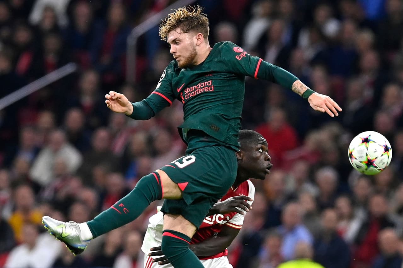 Liverpool's English midfielder Harvey Elliott (L) fights for the ball with Ajax's Dutch forward Brian Brobbey during the UEFA Champions League group A football match between Ajax Amsterdam and Liverpool at the Johan Cruijff ArenA in Amsterdam, on October 26, 2022. (Photo by JOHN THYS / AFP) (Photo by JOHN THYS/AFP via Getty Images)