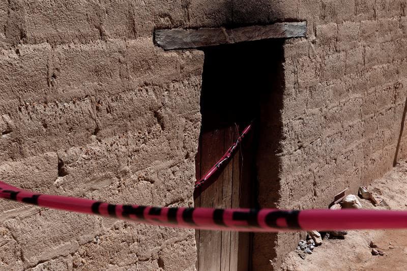 La cinta policiaca en la casa donde 11 personas fueron asesinadas.