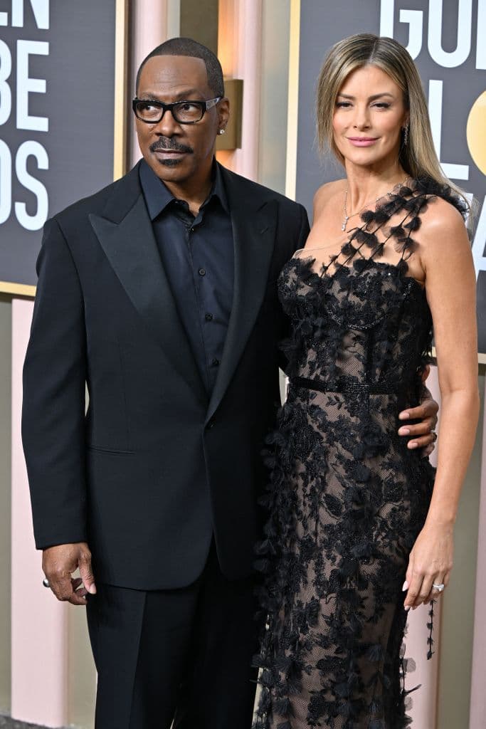 El famoso actor 
<b>Eddie Murphy y su pareja Paige Butcher</b> posaron para los fotógrafos del lugar.
<br>
