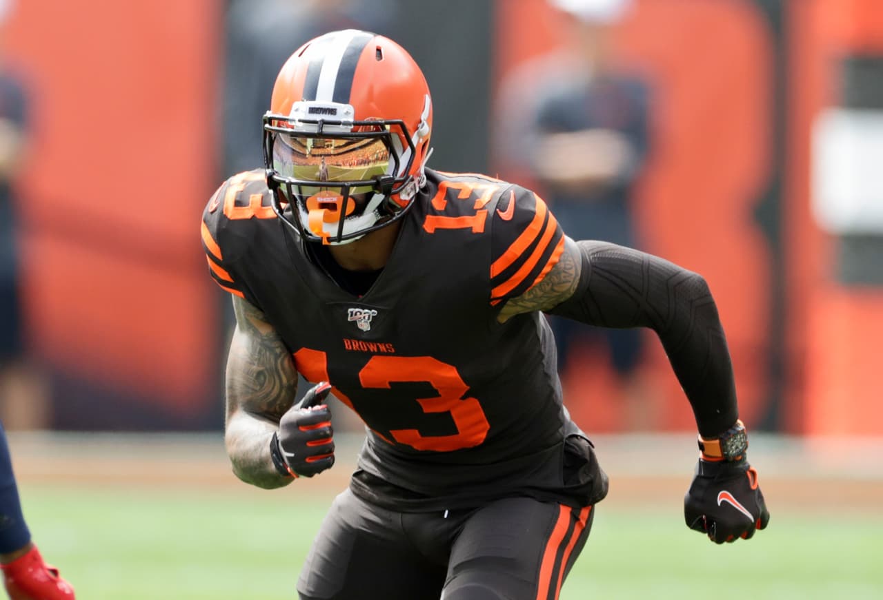 Cleveland Browns wide receiver Odell Beckham Jr. runs a route during the first half in an NFL football game against the Tennessee Titans, Sunday, Sept. 8, 2019, in Cleveland. The flashy, fashionable wide receiver sported an expensive watch, worth over $250,000, during his debut Sunday. The NFL plans to speak with Browns star Odell Beckham Jr. about wearing a watch in games. (AP Photo/Ron Schwane)