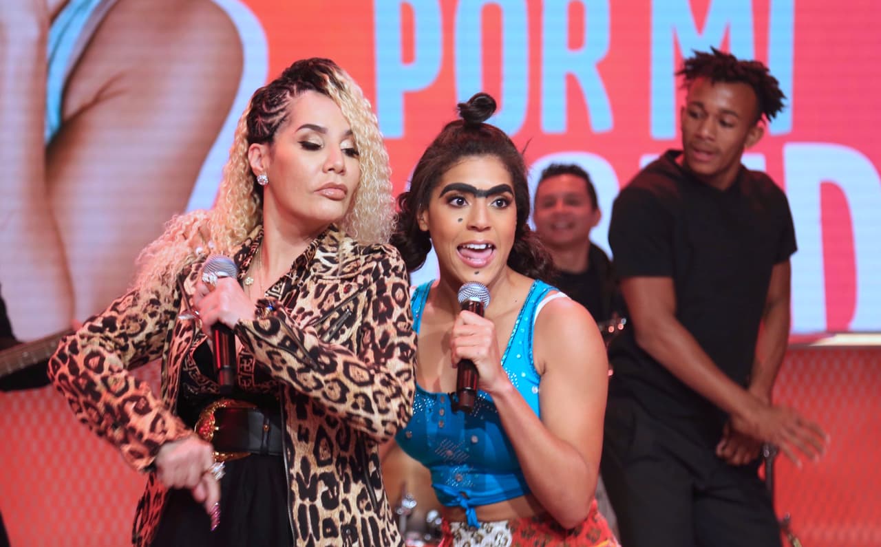 Luego de varios meses, Mela se presentó en el programa con una gran sorpresa que dejó impactados a todos en el estudio: se lanzó como cantante y su madrina fue una de las exponentes más grandes del género urbano, Ivy Queen.