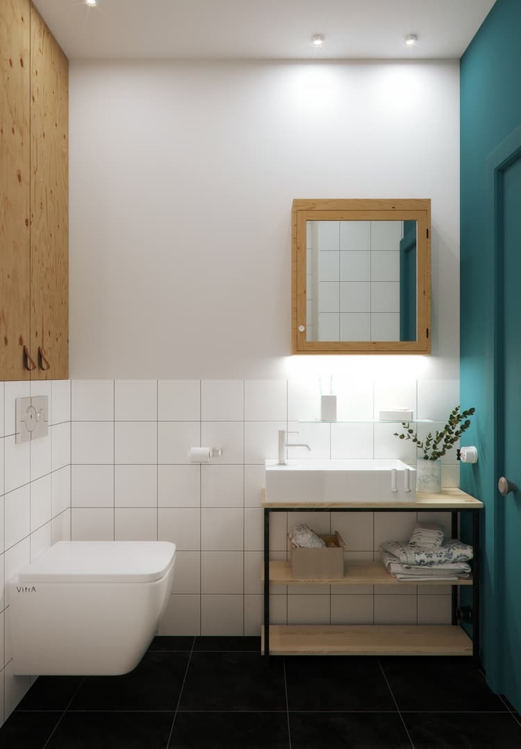 En el baño, colocar el lavamanos sobre una repisa gana espacio para almacenar toallas.