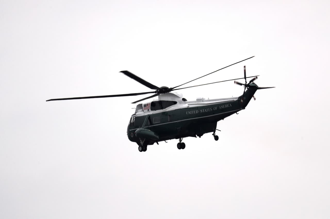 A Marine helicopter carries former president Barack Obama and Michelle Obama from the Capitol Hill in Washington, Friday, Jan. 20, 2017, en route to Andrews Air Force Base, Md. following the presidential inauguration of Donald Trump. (Rob Carr/Pool Photo via AP)