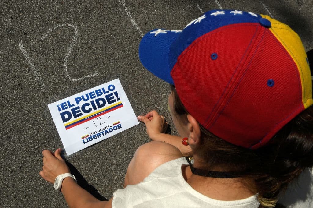 A volunteer organizes voting stations in Barcelona.