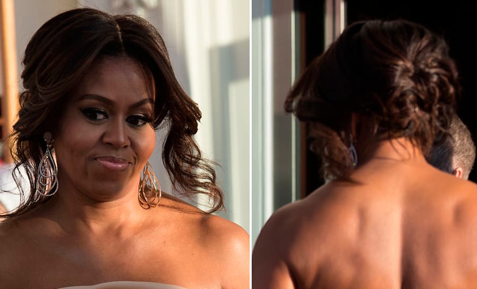 Michelle Obama decidió llevar
<b>un recogido medio bajo, con ondas y con raya en medio durante la cena de Estado con los líderes de Dinamarca, Noruega, Finlandia, Islandia y Suecia. Los mechones sueltos le aportaron movimiento</b> a su peinado. En estos años, no recordamos imagen alguna en la que la ella luciera trenzas, un peinado que tiene gran carga cultural.