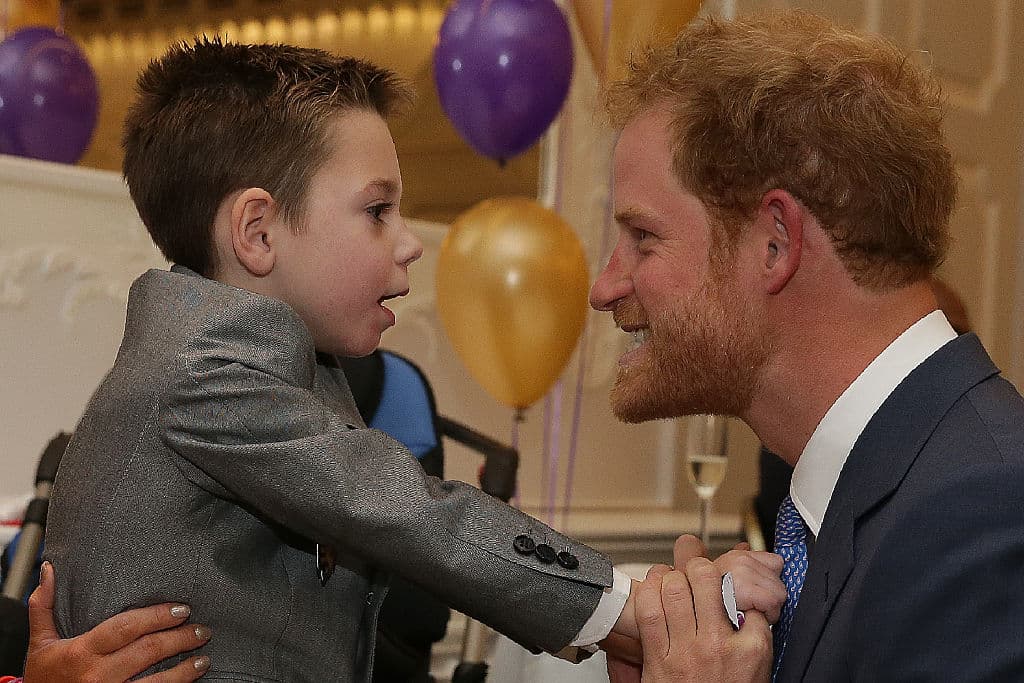 LONDON, ENGLAND - OCTOBER 3: Prince Harry greets Inspirational Child Award Winner Ollie Carroll, as they attend the WellChild Awards in London on October 3, 2016 in London, England. The awards recognise the courage of seriously ill children, their families and carers. (Photo by Daniel Leal-Olivas - WPA Pool/Getty Images)