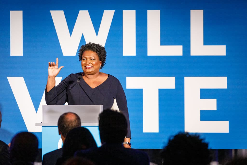 Former minority leader of the Georgia House of Representatives Stacey Abrams speaks to a crowd at a Democratic National Committee event at Flourish in Atlanta on June 6, 2019 in Atlanta, Georgia.