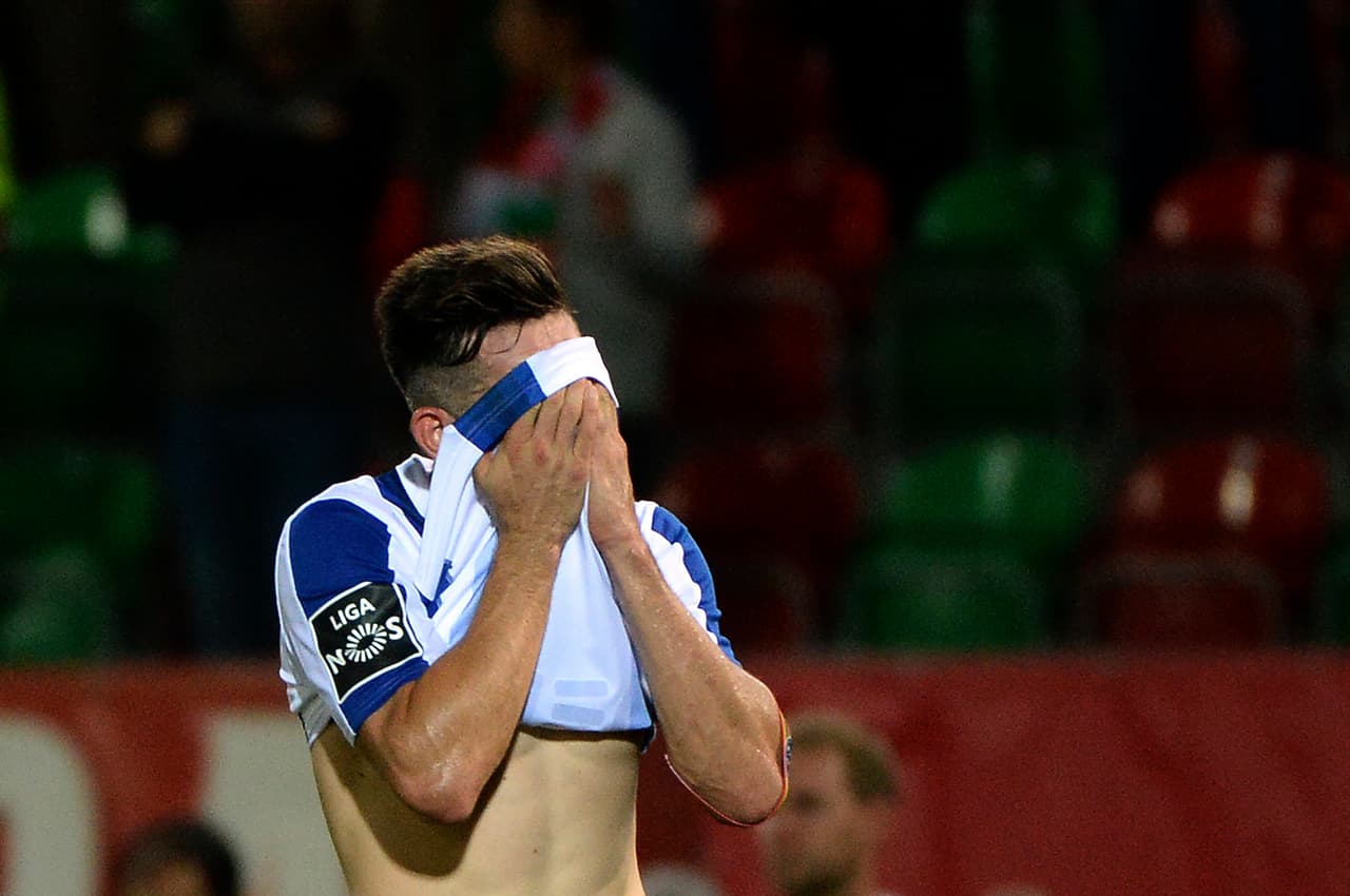 Porto's Mexican midfielder Hector Herrera covers his face as he leaves the field at the end of the Portuguese league football match CS Maritimo vs FC Porto at the Dos Barreiros stadium in Funchal on May 6, 2017. / AFP PHOTO / JOANA SOUSA (Photo credit should read JOANA SOUSA/AFP/Getty Images)