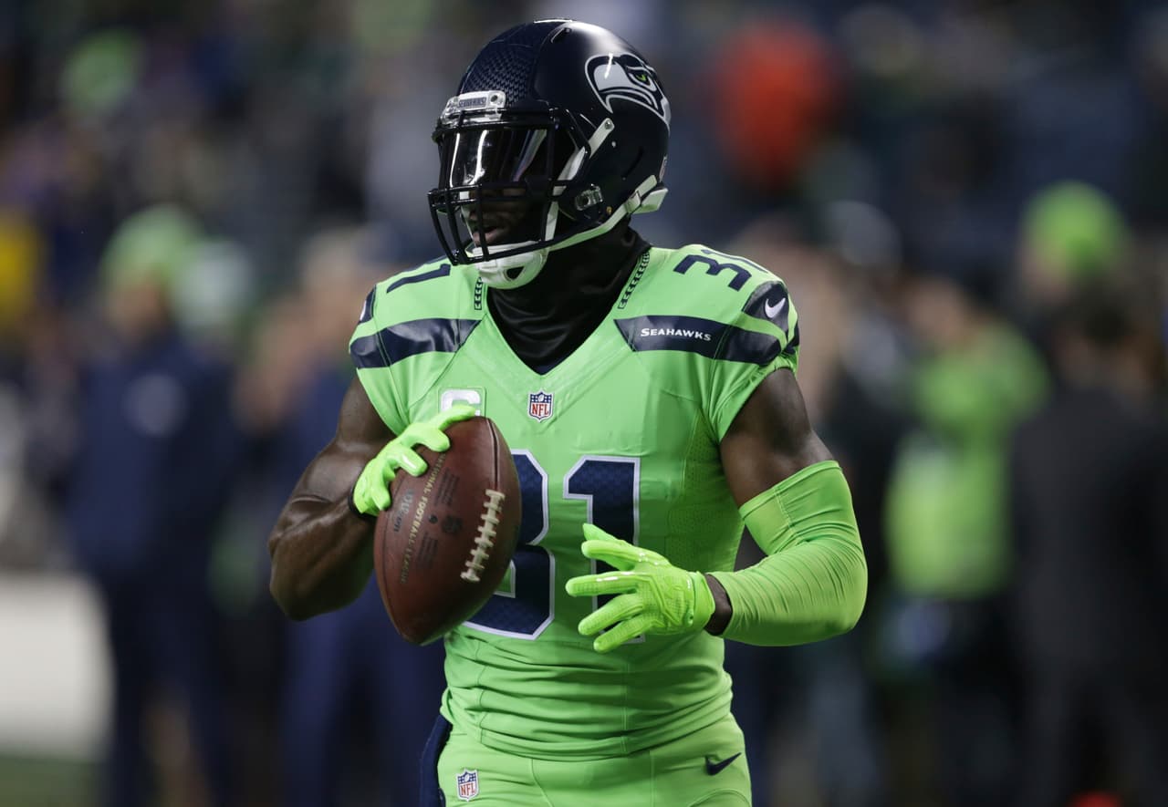 Seattle Seahawks strong safety Kam Chancellor wears the NFL color rush uniform before an NFL football game against the Los Angeles Rams, Thursday, Dec. 15, 2016, in Seattle. (AP Photo/Scott Eklund)