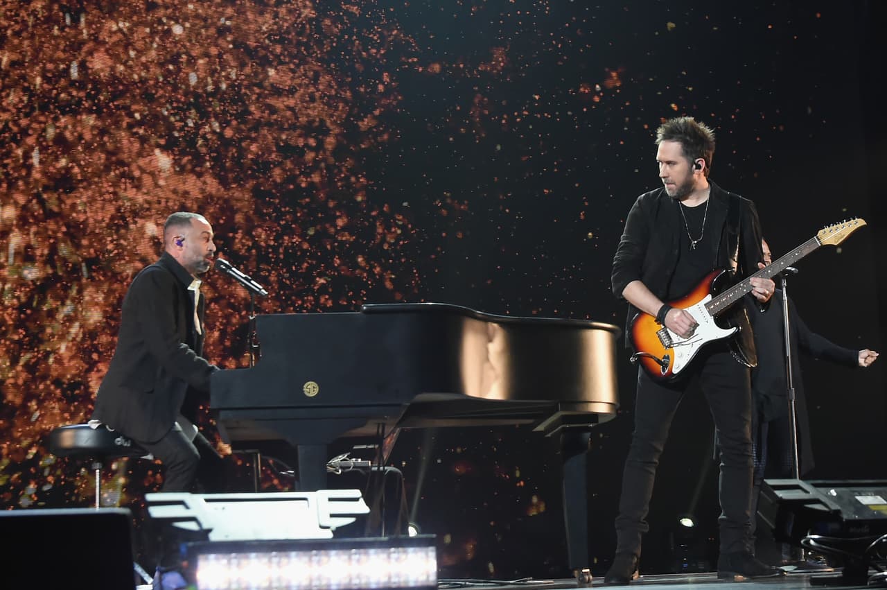 MIAMI, FL - OCTOBER 14: In this handout photo provided by One Voice: Somos Live!, Mario Domm and Pablo Hurtado of 'Camila' perform onstage at One Voice: Somos Live! A Concert For Disaster Relief at Marlins Park on October 14, 2017 in Miami, Florida. (Photo by Rick Diamond/One Voice: Somos Live!/Getty Images)