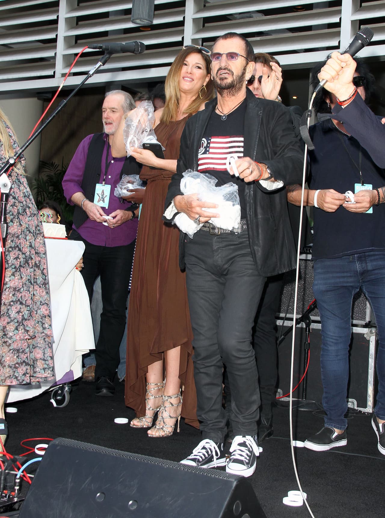 Daisy Fuentes y Richard Marx celebran con Ringo.