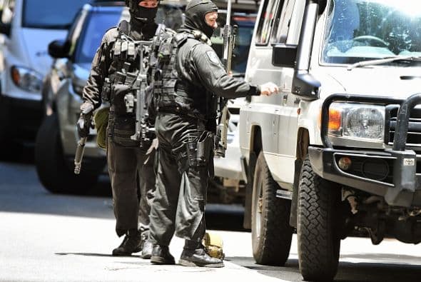 El distrito comercial de Sídney se encuentra blindado ante la sorpresiva toma de rehenes.