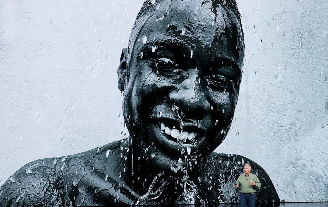 Phil Schiller, Apple's senior vice president of worldwide marketing, speaks about the camera on the Apple iPhone XS at the Steve Jobs Theater during an event to announce new Apple products Wednesday, Sept. 12, 2018, in Cupertino, Calif. (AP Photo/Marcio Jose Sanchez)