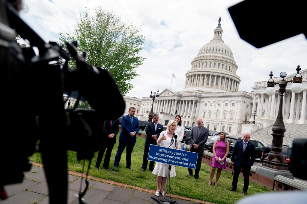 U.S. Sen. Kirsten Gillibrand (D-NY) (C) speaks during a news conference outside the U.S. Capitol on April 29, 2021 in Washington, DC. A bipartisan group of Senators gathered in support of the Military Justice Improvement and Increasing Prevention Act, which would move the decision to prosecute a member of the military from the chain of command to independent, trained, professional military prosecutors.