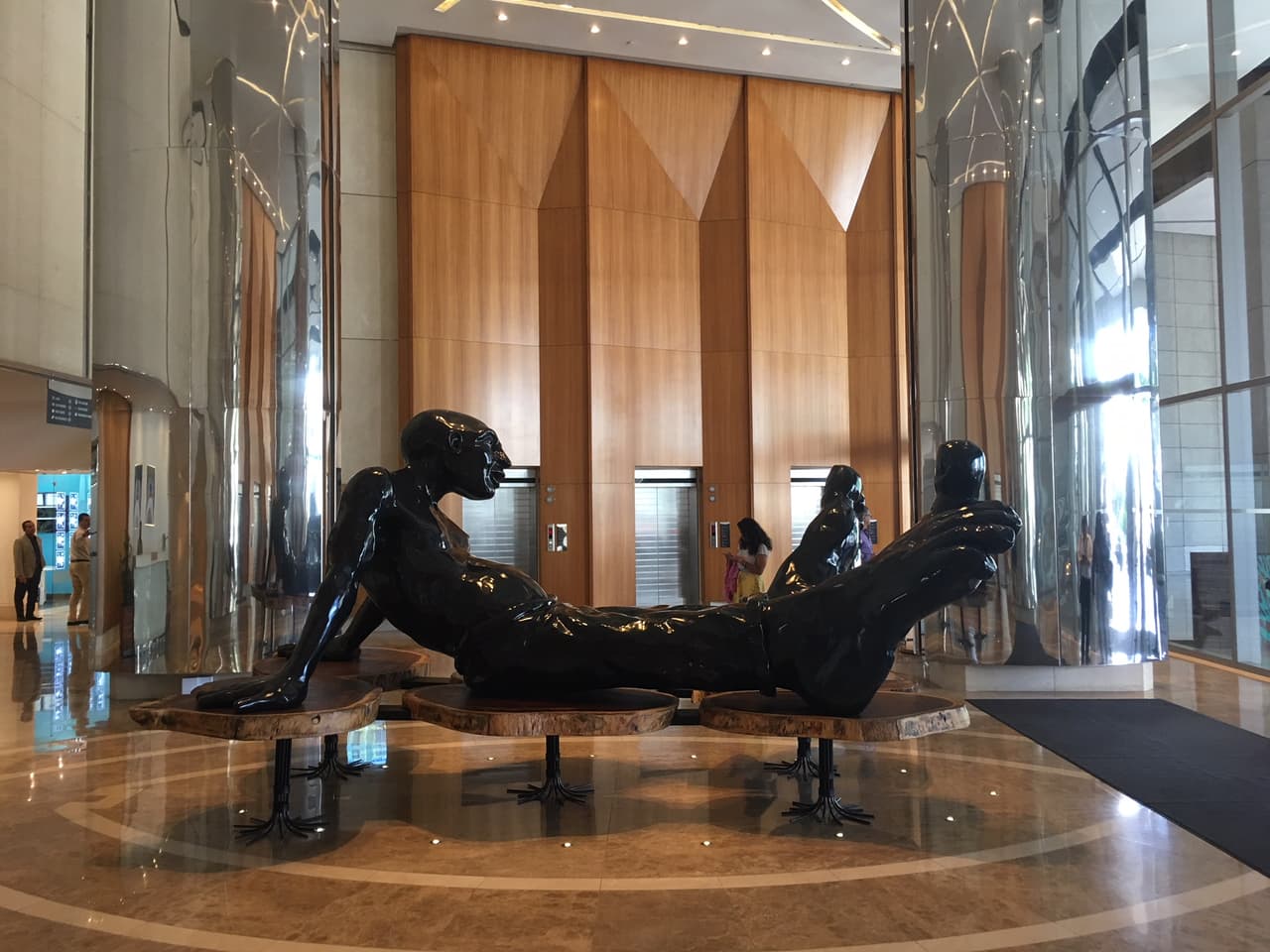 A large wood sculpture, titled 'Big Foot' by French-Israeli artist Idan Zareski in the lobby of Trump's Panama hotel. "Bigfoot, a peaceful individual with big feet, bares witness to human foolishness," according to the online art gallery Saatchi Art. 
<br>