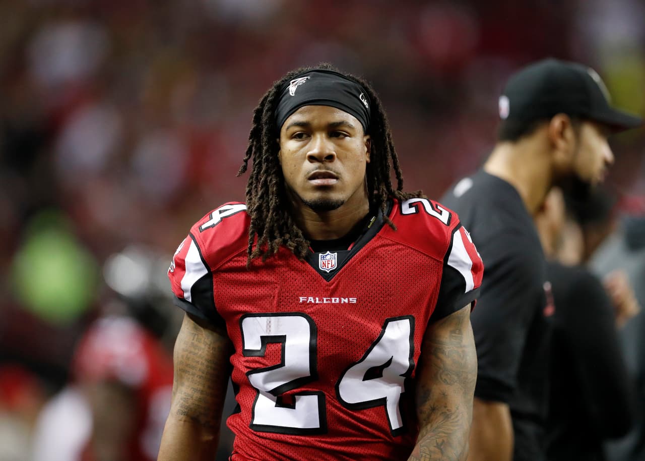 Atlanta Falcons running back Devonta Freeman (24) rests during the NFC Conference Championship game against the Green Bay Packers on Sunday, Jan. 22, 2017, in Atlanta, Ga. The Falcons won the game, 44-21. (Greg Trott via AP)