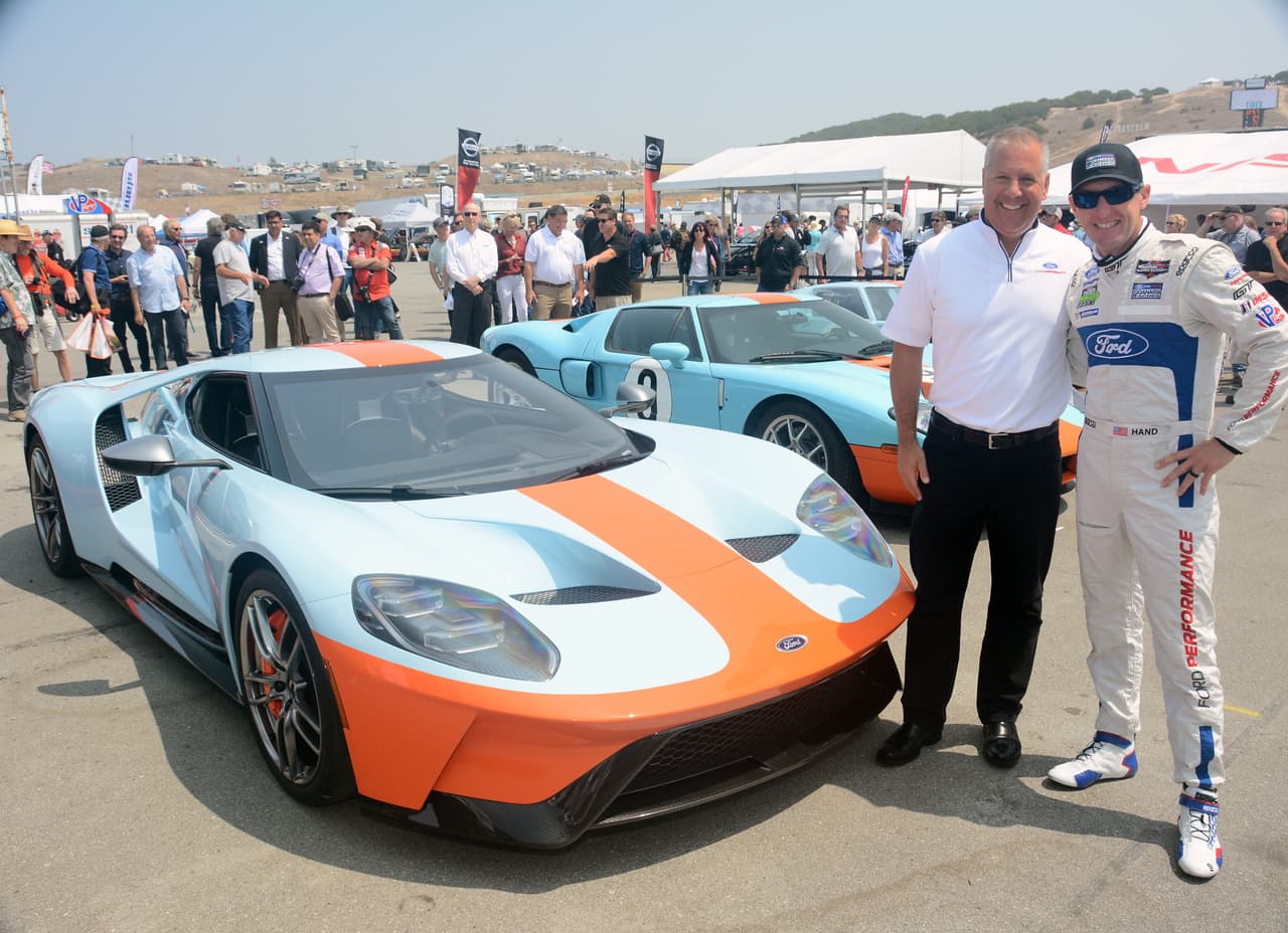 Joe Hinrichs (left), executive vice president and president of Global Operations, Ford Motor Company, and Joey Hand (right), professional race car driver and co-driver of the 2016 Le Mans-winning Ford GT race car, are shown with the 2019 Ford GT Heritage Edition celebrating the 50th anniversary of the 1968 and 1969 Le Mans-winning GT40 with limited-edition Gulf Oil tribute racing livery – auto racing’s most famous paint scheme.