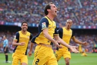 Godín celebra el gol del empate que vale una Liga para el Atlético de Madrid.