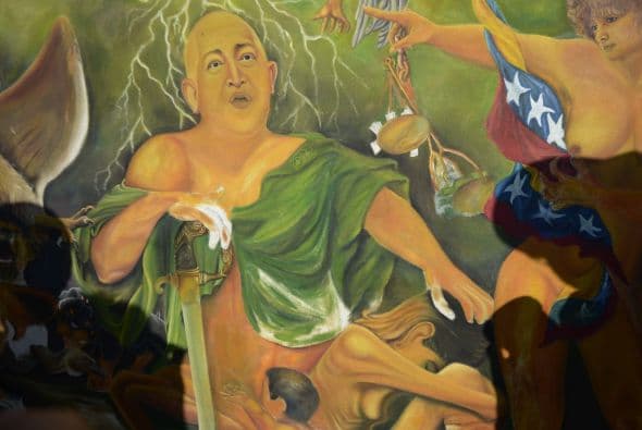 Pero el culto a Hugo Chávez también se ha extendido al ámbito del arte. Esta pintura fue hecha por partidarios del mandatario y la mostraron durante su funeral, el 8 de marzo de 2013.
