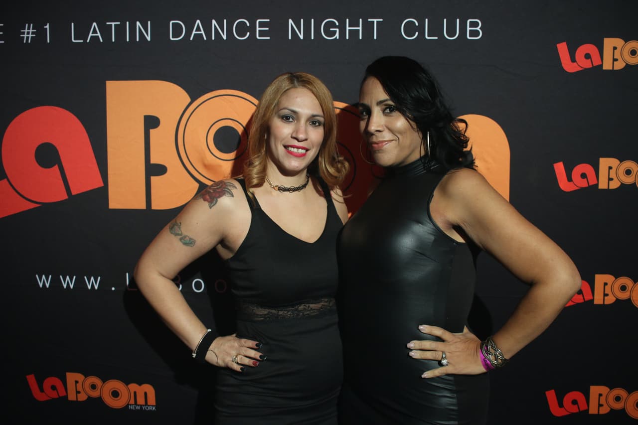 <b>Vanessa Rivera, 42, de Bronx, NY, y Jennifer Marrero, 37, de Yonkers, NY.</b>
<br>
<br>
<b>¿Qué es el trap?</b> It’s hip hop trap but in Spanish.
<br>
<br>
<b>¿Por qué te gusta?</b> I’ve been listening to reggaeton since I was 15 years old. It’s part of my culture since I’m from Puerto Rico.
<br>
<br>
<b>Trap en una palabra: </b>Grouchy.
<br>