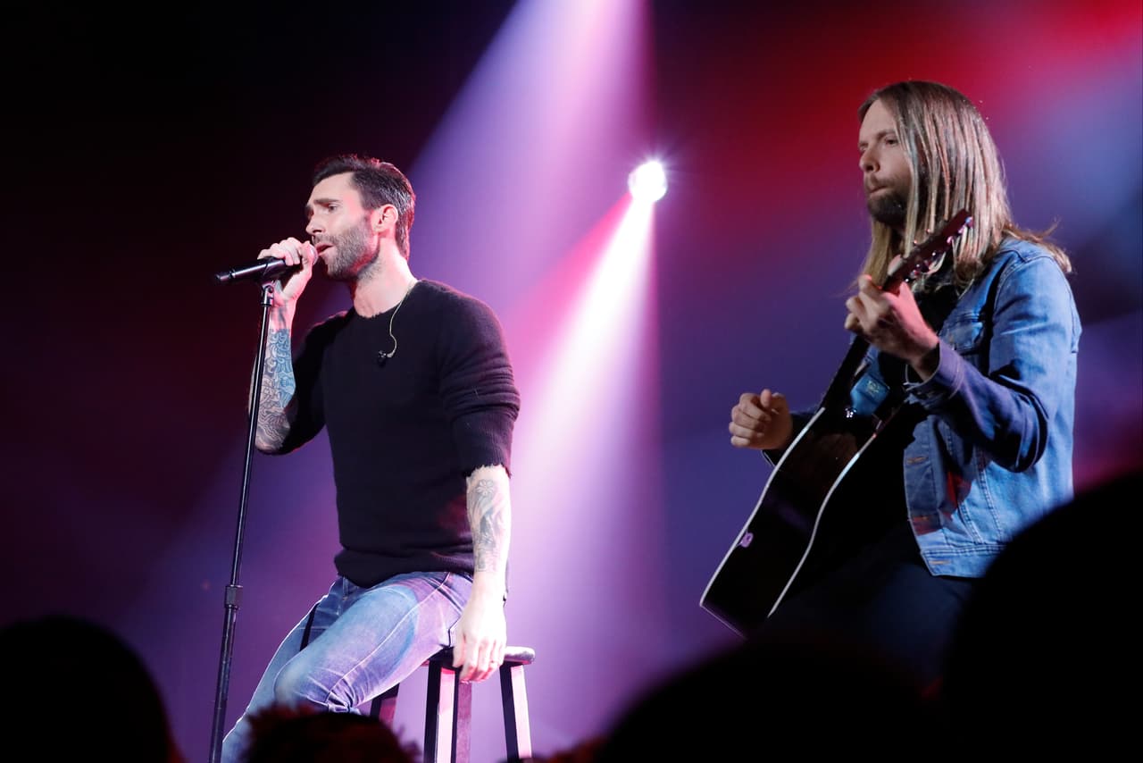 LOS ANGELES, CA - OCTOBER 14: In this handout photo provided by One Voice: Somos Live!, (l-r) Adam Levine and James Valentine of Maroon 5 perform onstage during "One Voice: Somos Live! A Concert For Disaster Relief" at the Universal Studios Lot on October 14, 2017 in Los Angeles, California. (Photo by Evans Vestal Ward /NBCUniversal/One Voice: Somos Live!/Getty Images)