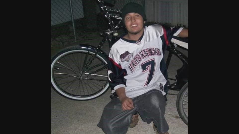 Roendy Granillo poses next to his bicycle in this undated photo
<br>