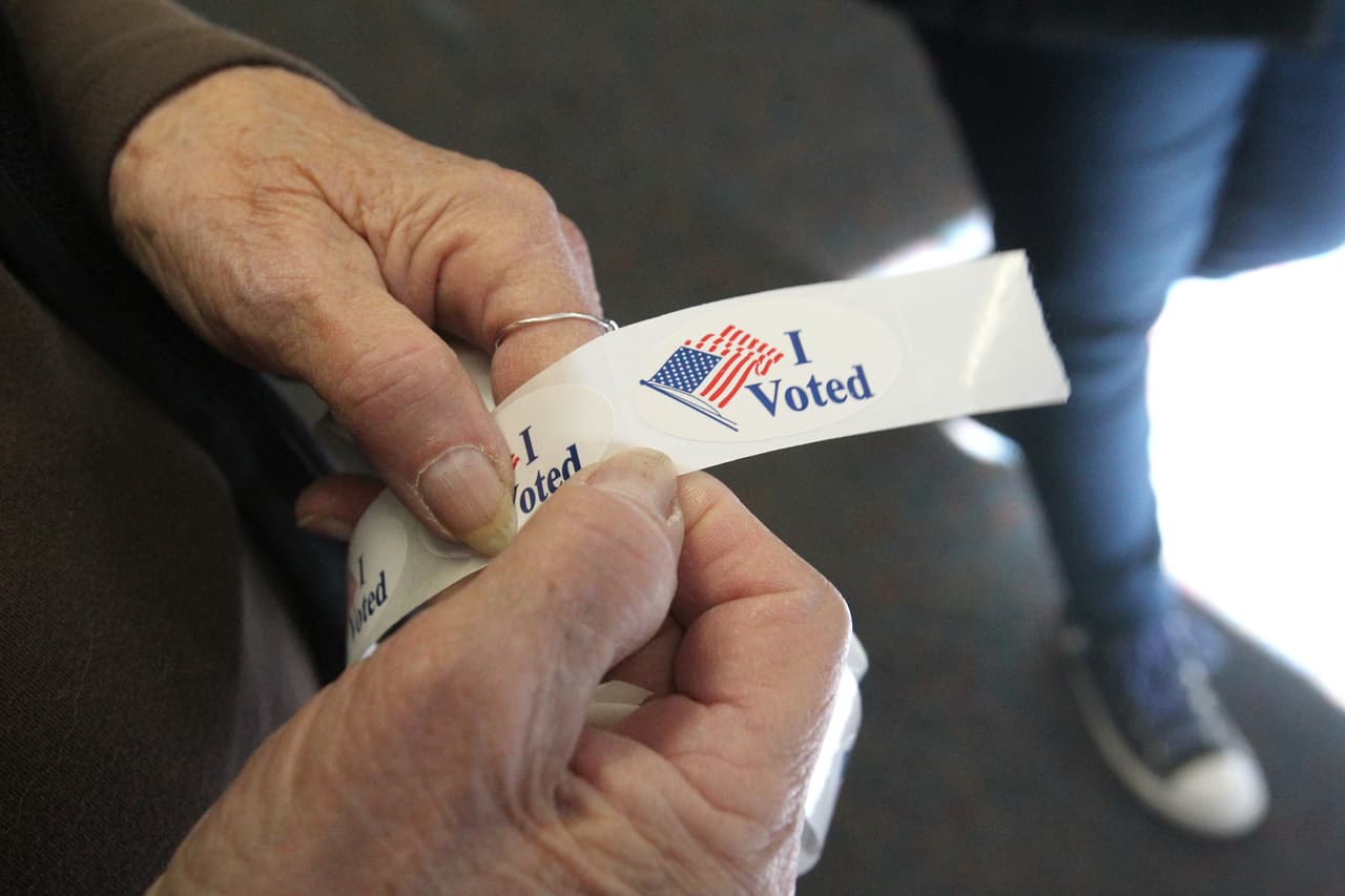 Voting stickers are displayed at a polling station in the Summit Christian Fellowship in Big Bear, California, November 8, 2016. / AFP / Bill Wechter (Photo credit should read BILL WECHTER/AFP/Getty Images)