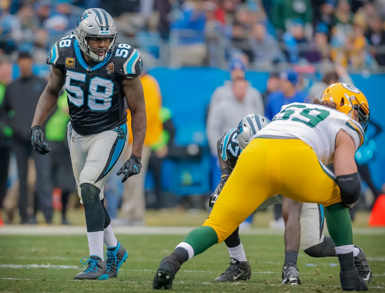 Carolina Panthers' Thomas Davis (58) listens for the ball to be snapped and to get around Green Bay Packers' David Bakhtiari (69) during the second half of an NFL football game in Charlotte, N.C., Sunday, Dec. 10, 2017. The Panthers won 31-24. (AP Photo/Bob Leverone)