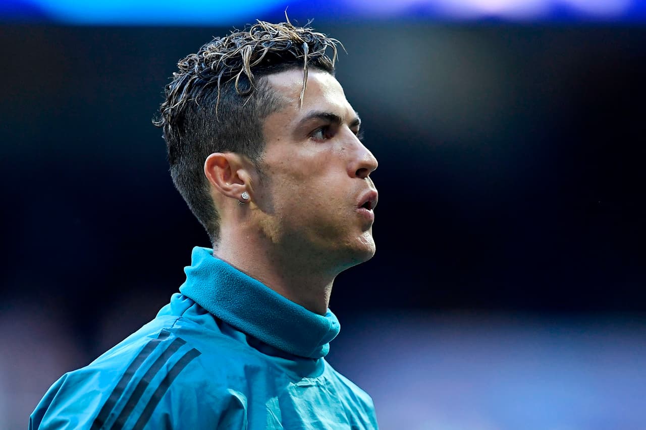Real Madrid's Portuguese forward Cristiano Ronaldo warms up before the UEFA Champions League semi-final second leg football match between Real Madrid and Bayern Munich at the Santiago Bernabeu Stadium in Madrid on May 1, 2018. (Photo by OSCAR DEL POZO / AFP) (Photo credit should read OSCAR DEL POZO/AFP/Getty Images)