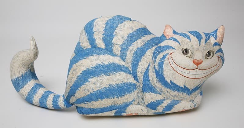 La curiosa historia detrás del gato de Cheshire y su inquietante sonrisa