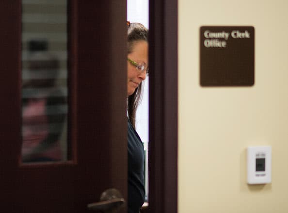 Kim Davis is required to give marriage licenses