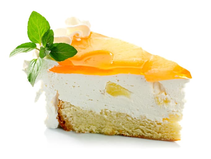 Delicioso pastel de crema y naranja