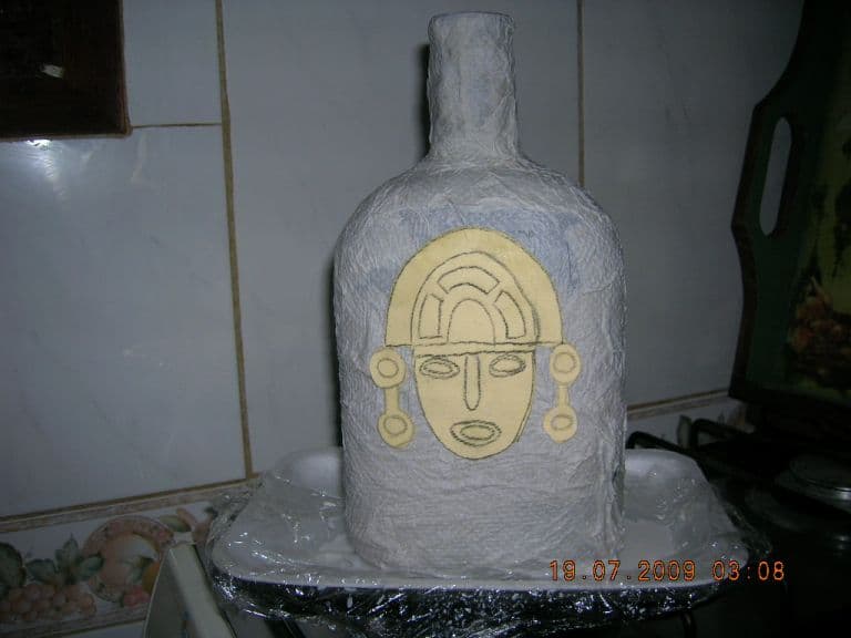 Botella con mascara precolombina, enviada por Adriana