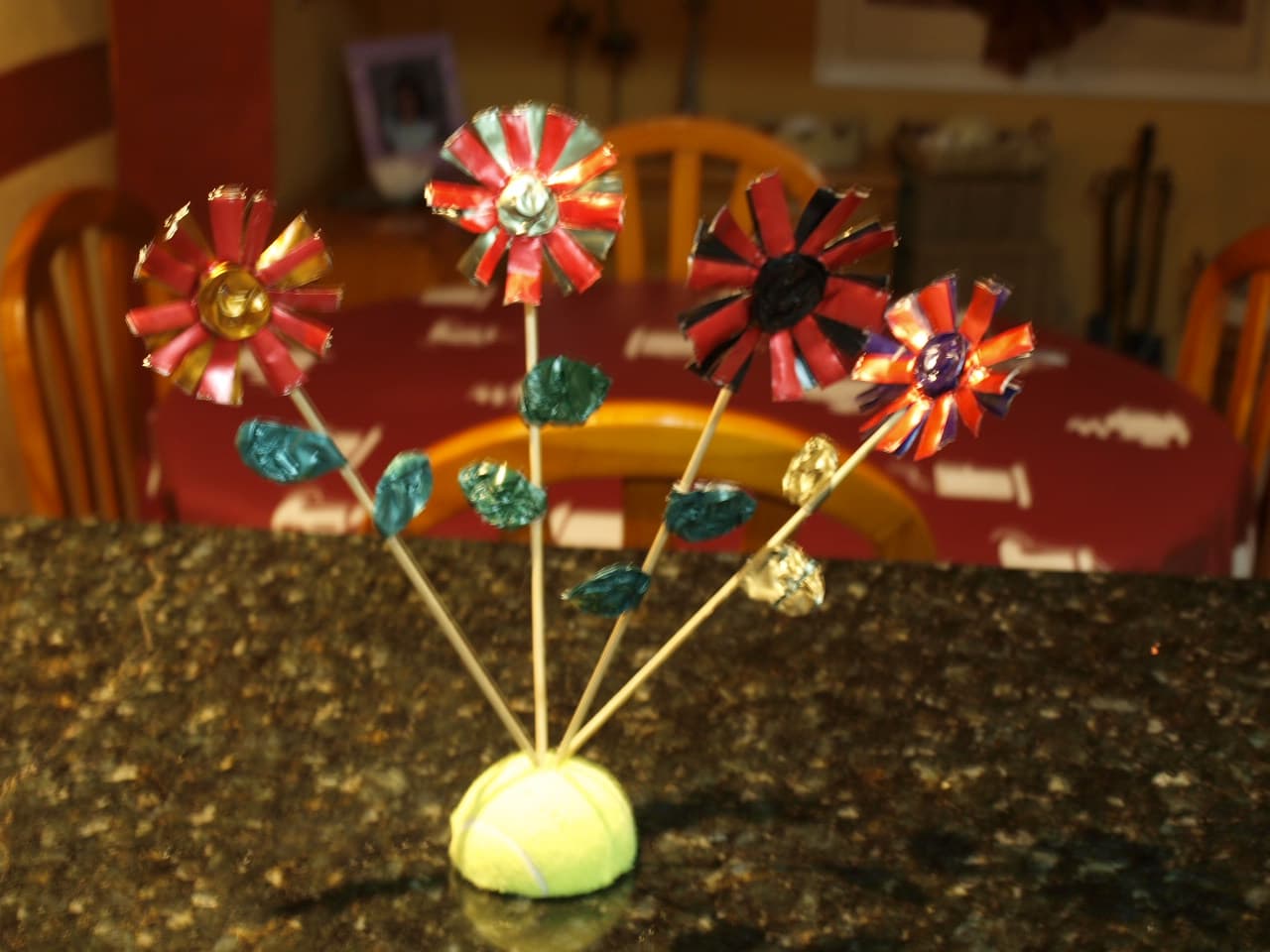 Flores con cápsulas de Nespresso, por Anna