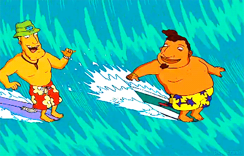 Tito y Ray surfeando