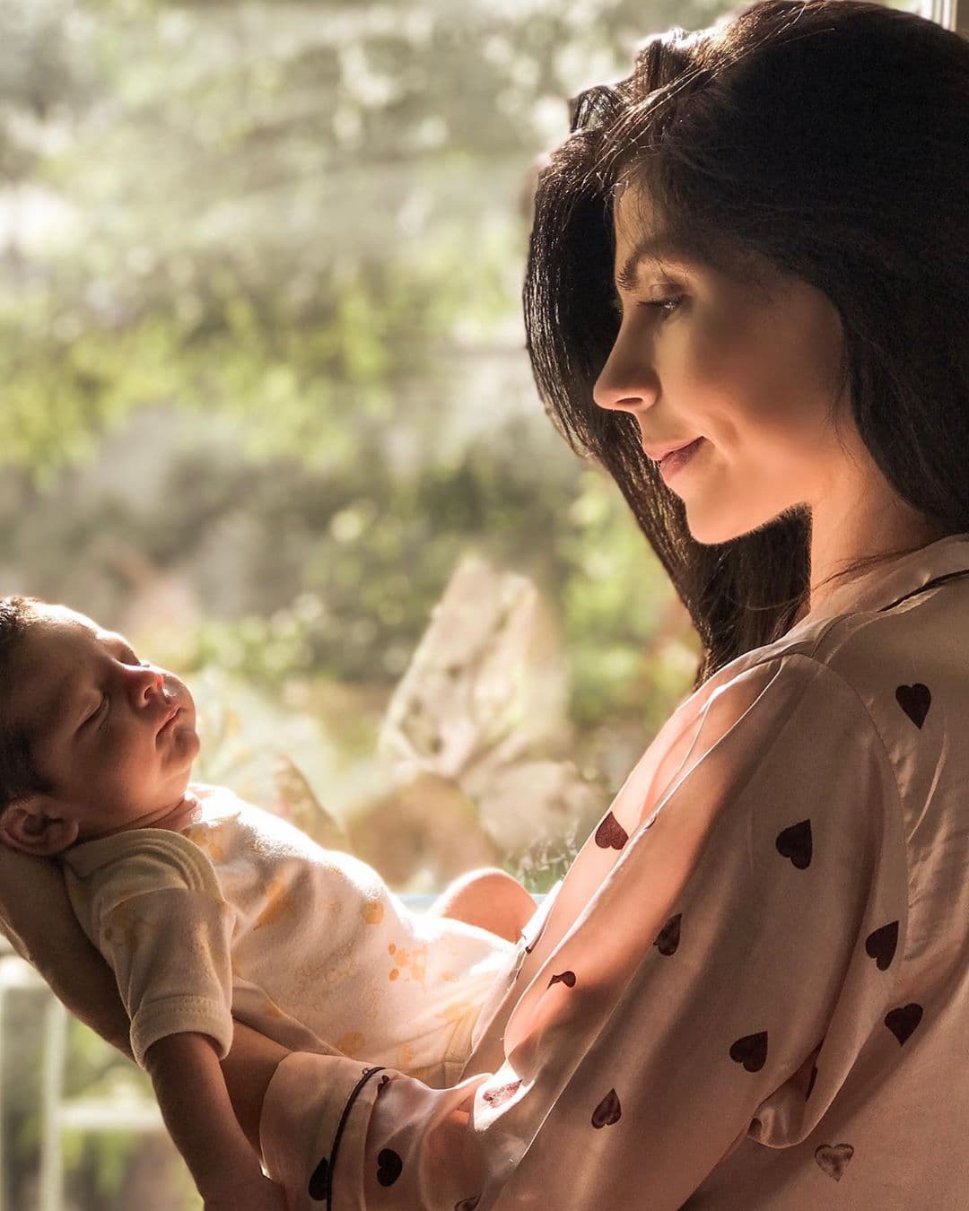 África Zavala y su hijo