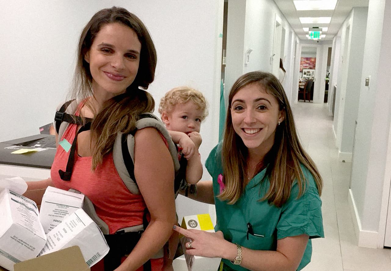 In this photo, Dr. Jennifer Schell with a volunteer helping pack medicine to be sent to Puerto Rico.