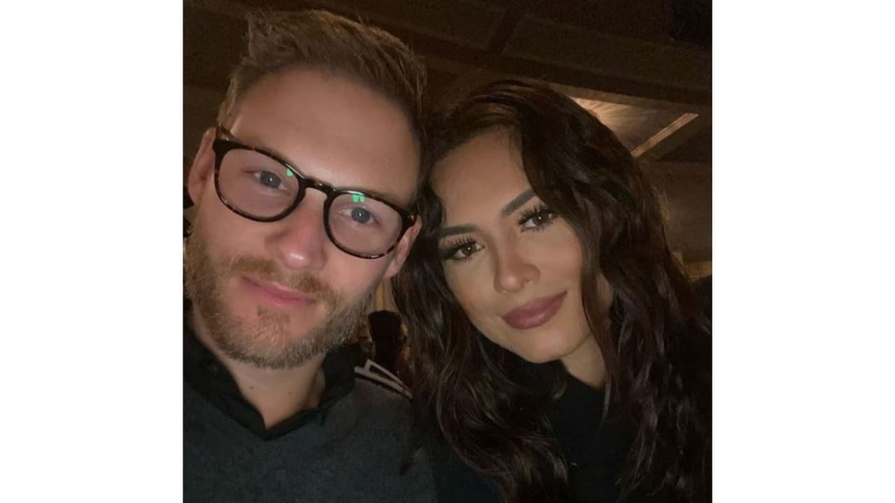 Andrea Meza y su novio