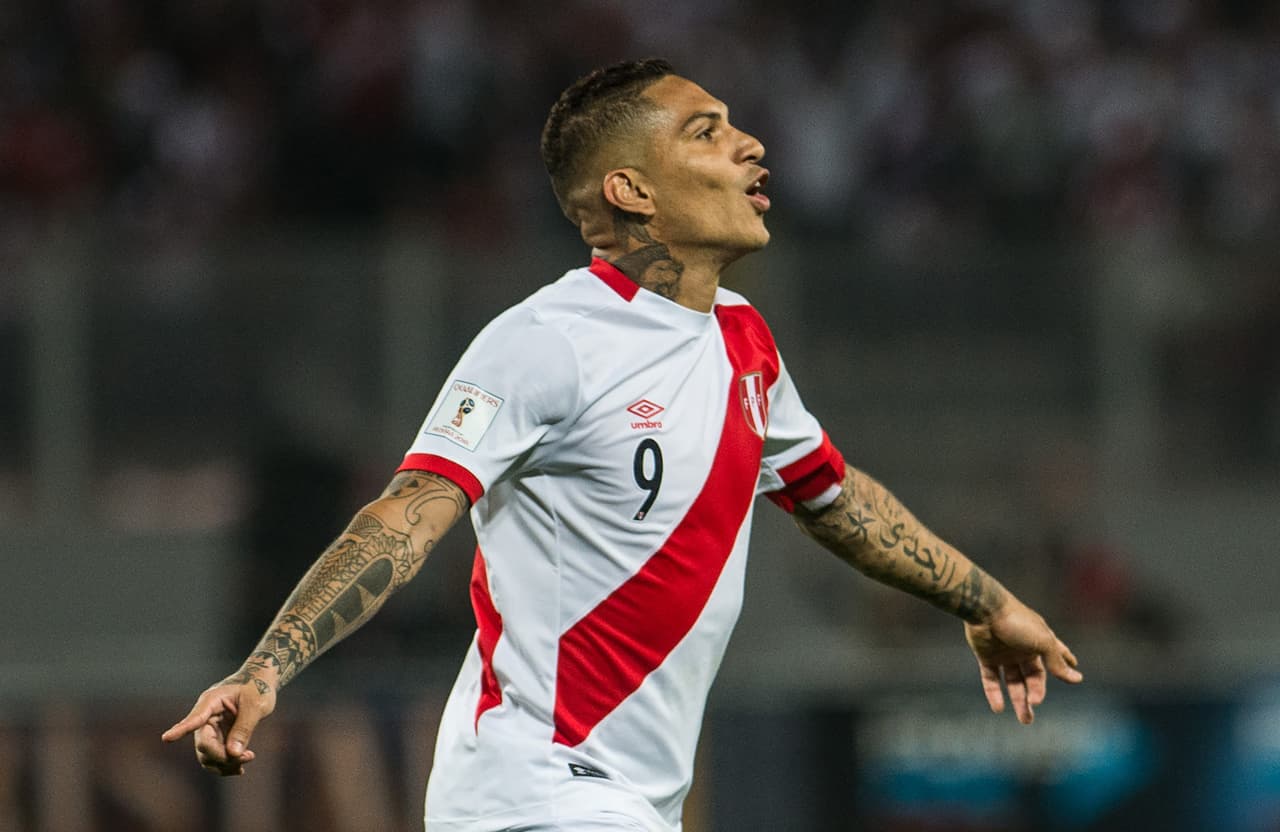 Peru's Paolo Guerrero celebrates after scoring against Colombia during their 2018 World Cup qualifier football match in Lima, on October 10, 2017. / AFP PHOTO / Ernesto BENAVIDES (Photo credit should read ERNESTO BENAVIDES/AFP/Getty Images)