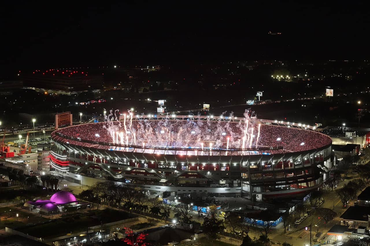 Fireworks explode over Monumental stadium before a soccer friendly between Argentina and Benin marking Lionel Messi's final appearance for the national team in Buenos Aires, Argentina, Tuesday, Oct.6, 2026. (AP Photo/Julian Bongiovanni)
