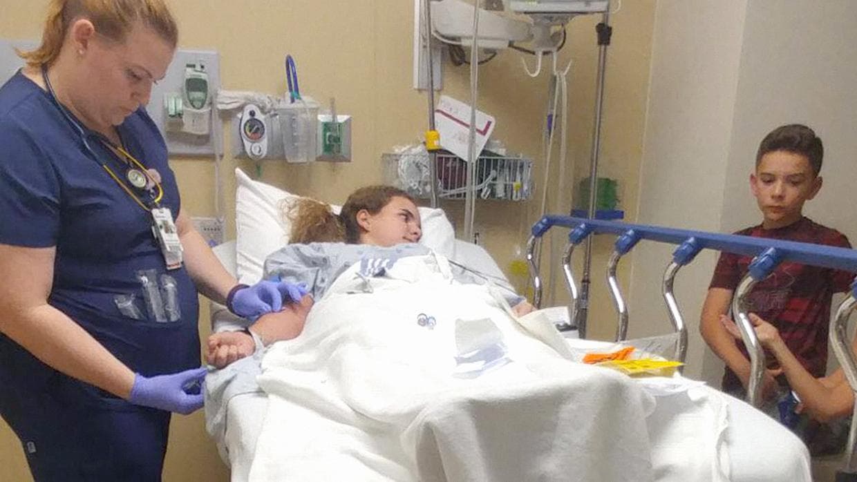 Venezuelan teenager Daniela Menescal Guariguata (17) was hit by three pieces of shrapnel. She managed to walk out of the school before receiving medical attention and described seeing the dead bodies of several fellow students. Seen here recovering in hospital.