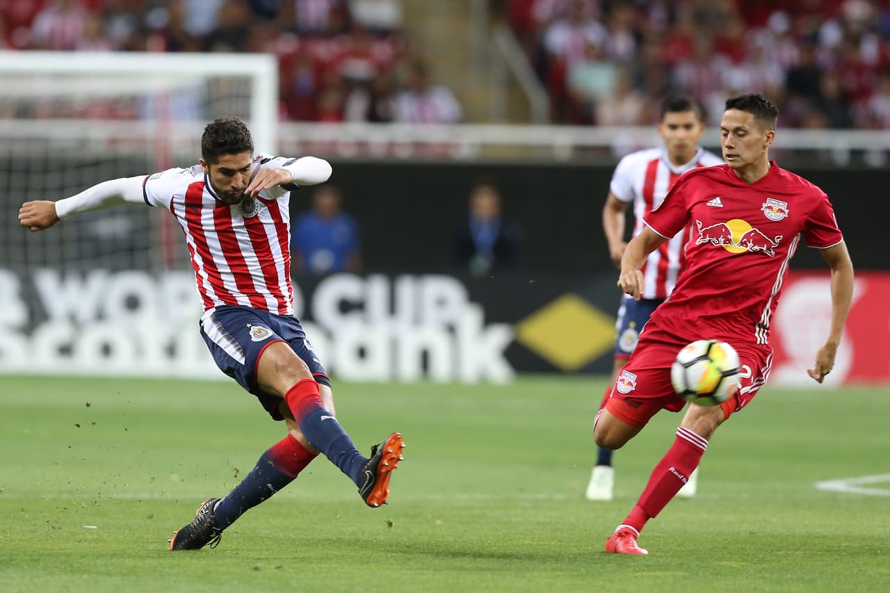 ZAPOPAN, MEXICO - APRIL 04: Jair Pereira of Chivas fights for the ball with Sean Davis of New York RB during the semifinal match between Chivas and New York RB as part of the CONCACAF Champions League at Akron Stadium on April 4, 2018 in Zapopan, Mexico. (Photo by Refugio Ruiz/Getty Images)
